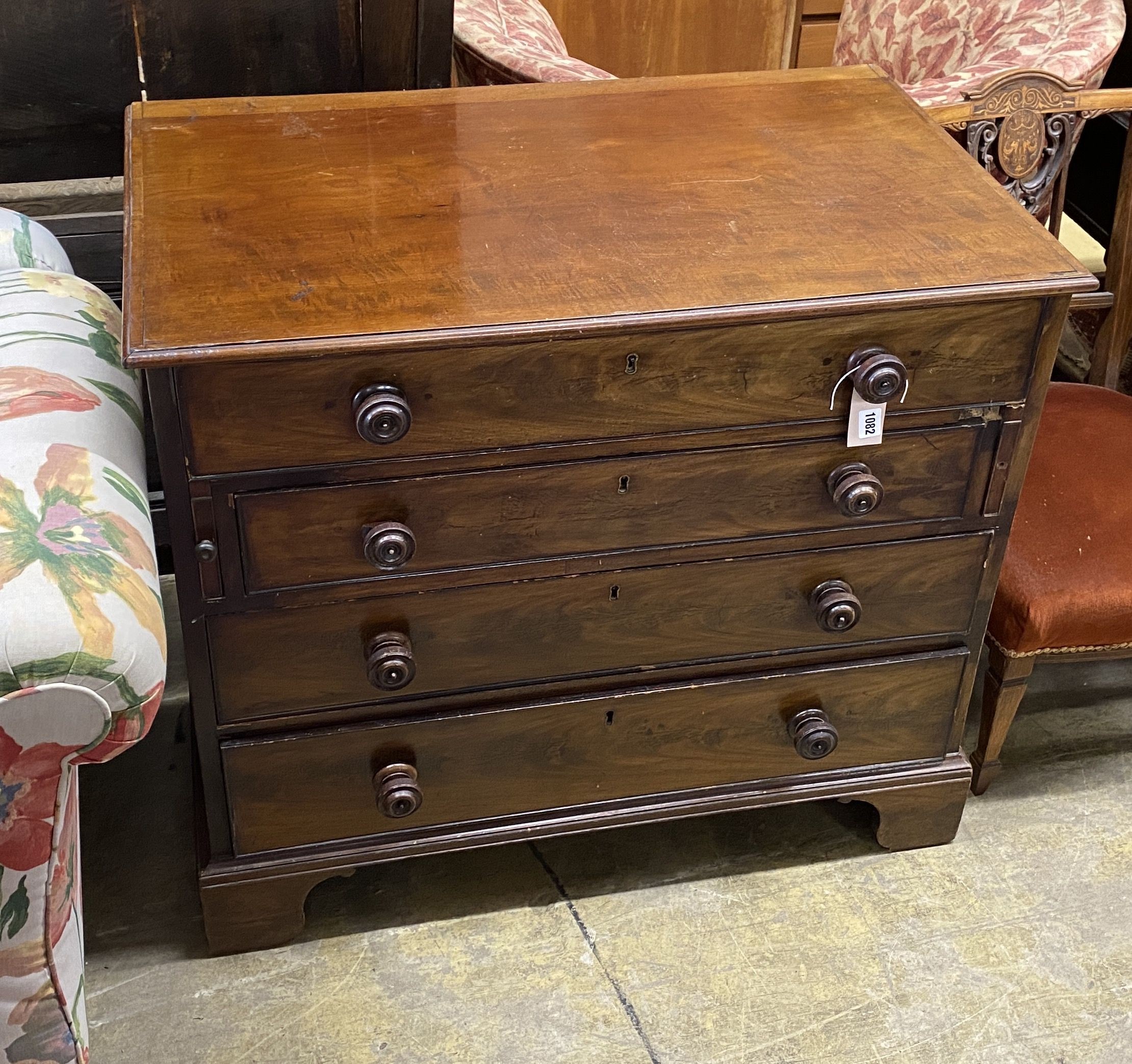 A George III mahogany dressing chest, with a fitted top drawer and later handles, width 91cm, depth 56cm, height 79cm